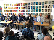 DA leader Mmusi Maimane, centre, is joined by eight of the DA premier candidates in Cape Town on April 23 2019. He criticised the ANC for not releasing its own list of premier candidates.