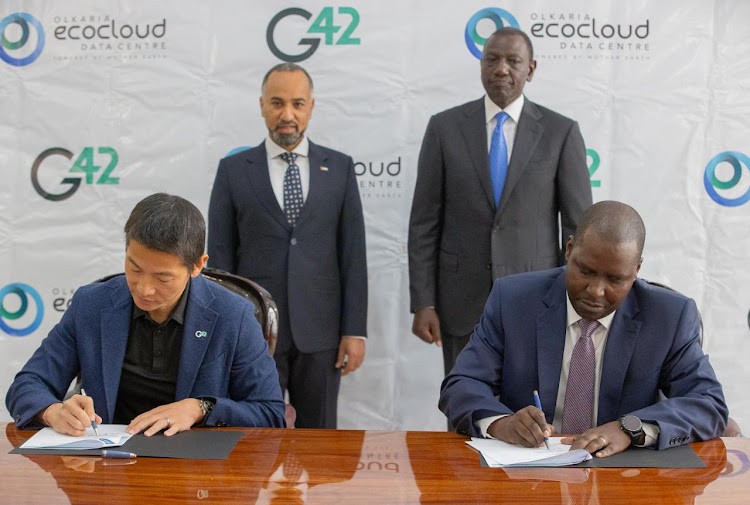 President William Ruto and UAE Ambassador to Kenya Salim Ibrahim Binahmed Mohamed Alnaqbi witnessed the signing of an MOU between Kenya's EcoCloud and UAE's G42 at State House, Nairobi on March 6, 2024.