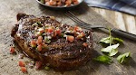 Cowboy Rib Eyes with Fresh Salsa was pinched from <a href="http://www.weber.com/recipes/beef/cowboy-rib-eyes-with-fresh-salsa" target="_blank">www.weber.com.</a>