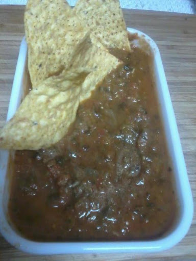 A mild Jalapeno Salsa for us couch potatoes who like to eat chips and drink beer while we watch TV.