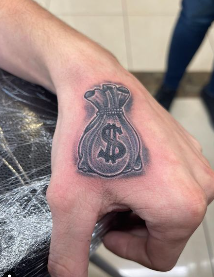 Tiny Money Bag Tattoo Design