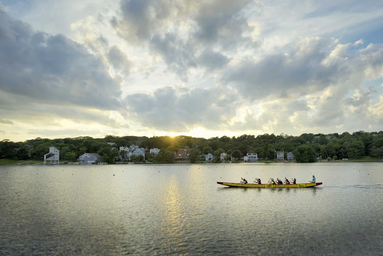 Locals take part in a bracing afternoon of rowing on Lake Banook in the Dartmouth community of Halifax, Nova Scotia.  