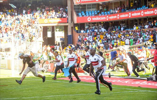 Orlando Pirates supporters on rampage during the Absa Premiership match between Mamelodi Sundowns and Orlando Pirates at Loftus Versfeld Stadium on February 11, 2017 in Pretoria, South Africa.