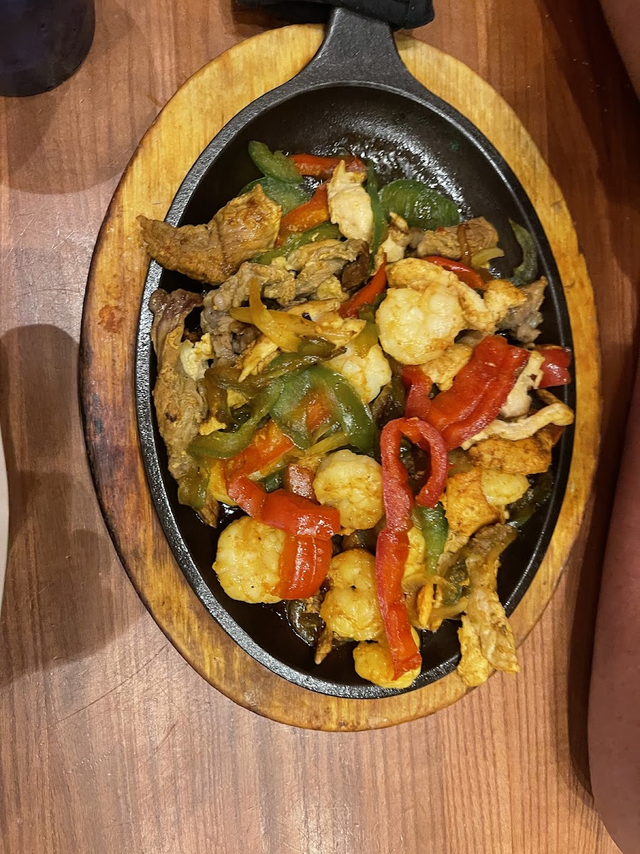 Fajitas with steak, shrimp and chicken