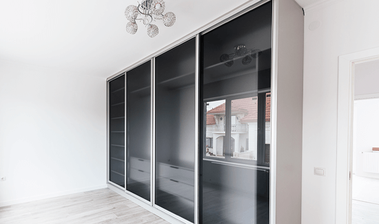 ARTUZ: Best Slim Glass & Acrylic Sliding Wardrobe Door Manufacturers, Modern Custom Sliding Wardrobe Door, Openable Wardrobes designers in Bangalore