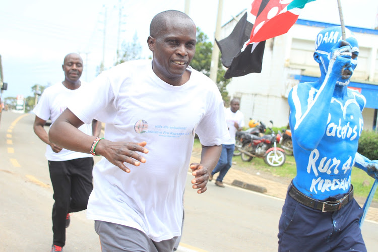Baringo Central MP Joshua Kandie runs during the 10km KIRDAM Road Race held in Kabarnet town on August 8, 2019.