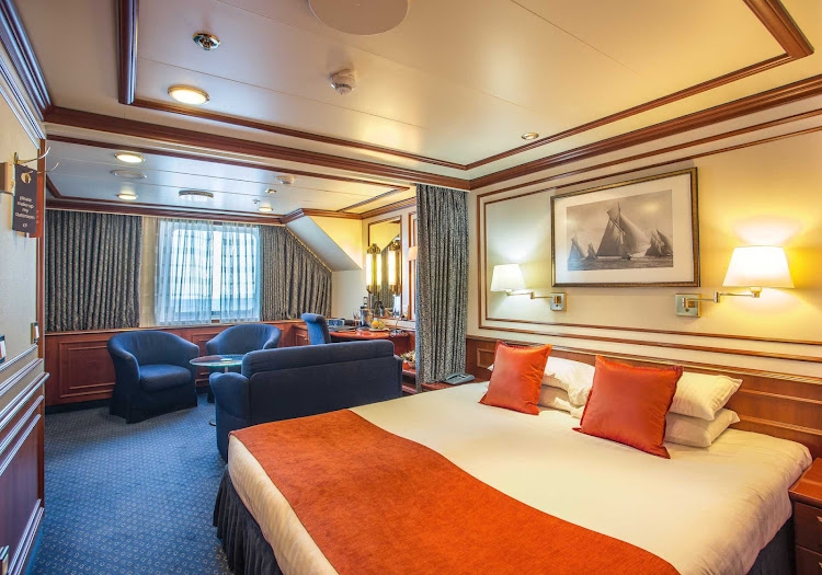 Relax in your Category 4 Deluxe Suite aboard National Geographic Orion during your Lindblad Expeditions trip.