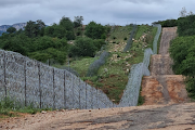 Three wire fences, including the new R37m fence, are erected along the border to keep desperate Zimbabweans from illegally entering SA. File photo.
