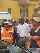 Home Affairs Minister Malusi Gigaba with SAPS at Rosettenville.