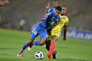 Jamie Webber of Supersport United and Wilson of Petro de Luanda during the CAF Confederations Cup match between Supersport United and Petro de Luanda at Lucas Moripe Stadium on March 16, 2018 in Pretoria, South Africa.
