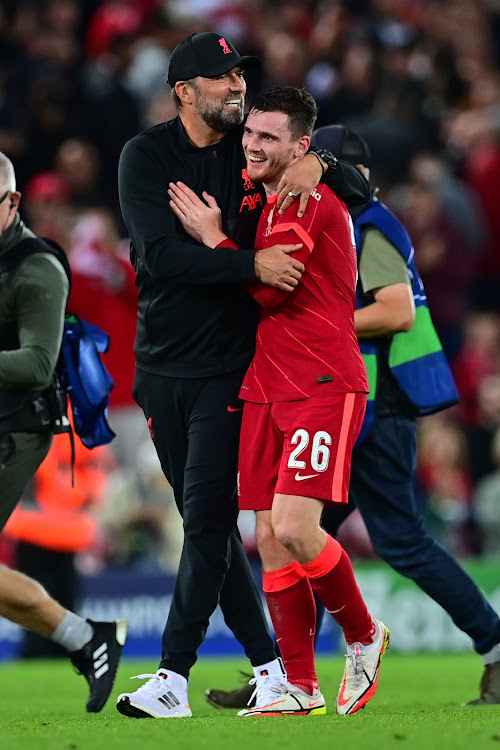 Liverpool manager Jurgen Klopp withdefender Andrew Robertson