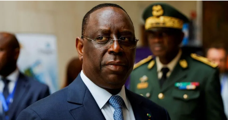 President Sall was accused by critics of trying to cling to power