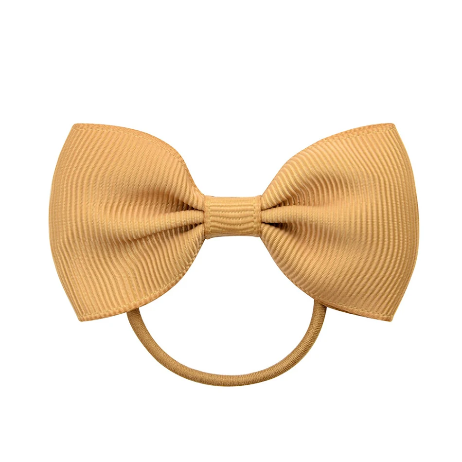 Elastische haarband met strik voor kinderen, schattig en lief. Gemakkelijk te gebruiken, perfect voor het haar van kleine meisjes.