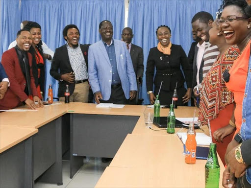 ODM leader Raila Odinga with Jubilee and NASA youths during a meeting at Capitol Hill, Nairobi on Wednesday, September 19, 2018. /COURTESY