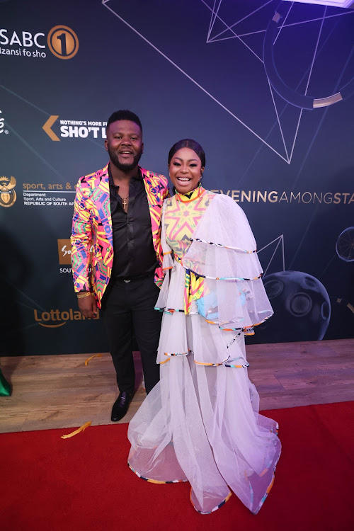Motlatsi Mafatshe and Gabi Tshabalala pose for a portrait on the red carpet, 11 March 2023, in Sandton, Johannesburg, during the 6th Royalty Soapie awards. Picture: Alaister Russell