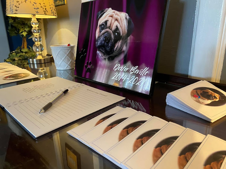 A Book of Remembrance for Dexter was signed by mourners.