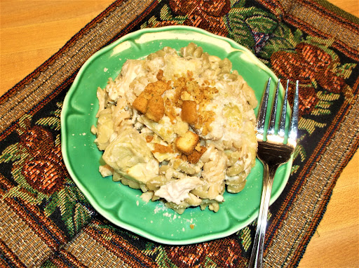 Plated chicken & artichoke pasta salad.