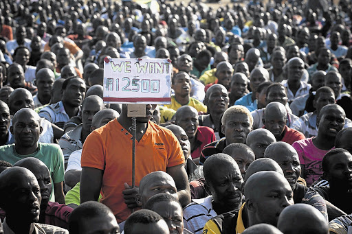 Strikers at Marikana platinum mine, near Rustenburg, who are joining forces with nearby Amplats workers in a wage battle that threatens to paralyse platinum mining Picture: DANIEL BORN