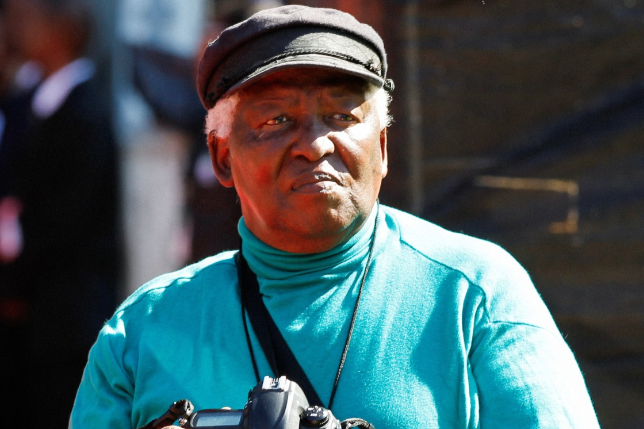 Photojournalist Peter Magubane looks on during the funeral of Albertina Sisulu in Johannesburg on June 11 2011. He died on Monday aged 91.