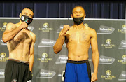 South Africa's Ludumo Lamati (right) beat Jose Martin Estrada Garcia (left) to lift the vacant IBO junior-featherweight crown at Emperors Palace on Saturday night.
