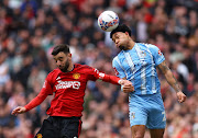 Coventry City's Milan van Ewijk in action with Manchester United's Bruno Fernandes in the FA Cup semifinal at Wembley Stadium in London on Sunday.