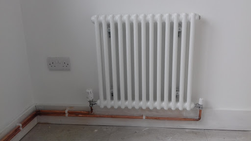 Wall mounted column radiator in loft conversion