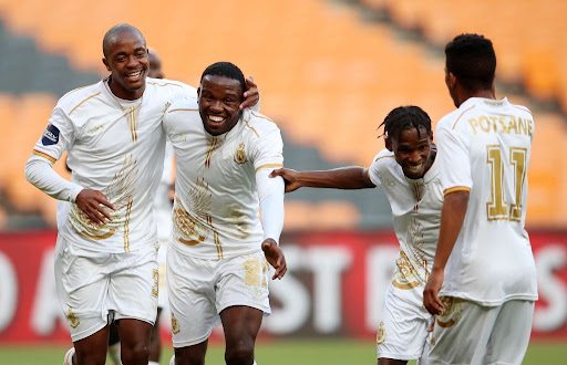 Victor Letsoalo of Royal AM (c) celebrates goal with teammates during the DStv Premiership match between Kaizer Chiefs and Royal AM at FNB Stadium on September 18, 2021 in Johannesburg, South Africa.