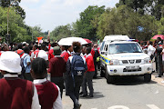 Pupils protest outside Hoërskool Kriel in Emalahleni, Mpumalanga.