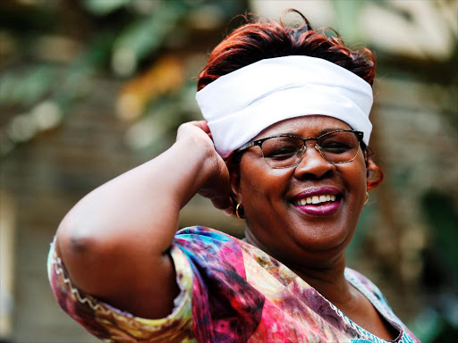 Kandara MP Alice Wahome arrive in Parliament in a white head band in support of the the two-thirds gender rule bill. November 20, 2018. /JACK OWUOR