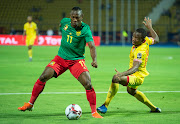 Christian Bassogog of Cameroon and Seibou Mama of Benin during the 2019 Africa Cup of Nations Group F match in Ismailia, Egypt. Bassogog has tested positive for Covid-19 on the eve of the 2021 Nations Cup's kickoff on January 9.
