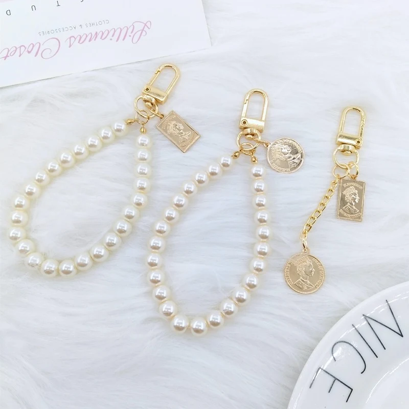 Korean Style Vintage Beauty Head Pearl Chain Keychain. A stylish and practical accessory, perfect for keys, bags, or as 