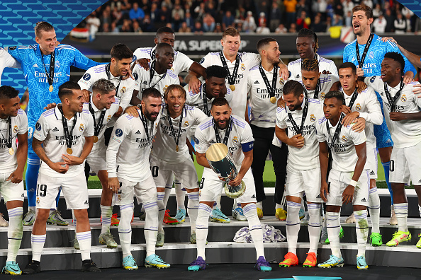 Karim Benzema of Real Madrid lifts the UEFA Super Cup following their win over Eintracht Frankfurt in the final at Helsinki Olympic Stadium.