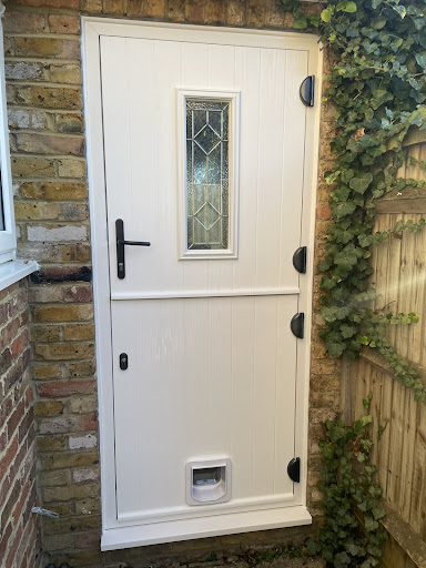 New White Composite Front door and Added cat flap