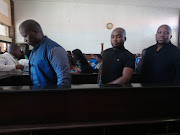 Sibonelo Myeza, Mbulelo Mpofana and Mxolisi Ncalane in the dock at the Umzimkhulu Magistrate's Court on Tuesday. They are charged with the murder of former ANCYL leader Sindiso Magaqa.