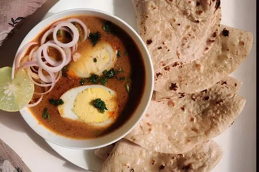 Anda Curry [1 Egg] With 2 Tawa Roti And Papad