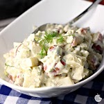 Creamy Dill and Cucumber Potato Salad was pinched from <a href="http://www.reneeskitchenadventures.com/2015/06/creamy-dill-and-cucumber-potato-salad.html" target="_blank">www.reneeskitchenadventures.com.</a>