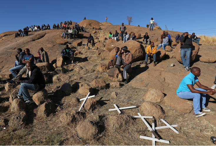 Crosses are placed at a hill known as the "Hill of Horror", during the one-year anniversary commemorations to mark the killings of 34 striking platinum miners shot dead by police outside the Lonmin's Marikana platinum mine in Rustenburg, 100 km (62 miles) northwest of Johannesburg, on August 16, 2013.