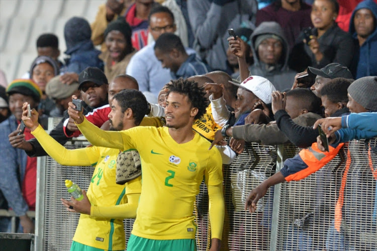 Abbubaker Mobara and Rivaldo Coetzee during the International friendly match between South Africa and Zambia at Moruleng Stadium on June 13, 2017 Moruleng, South Africa.