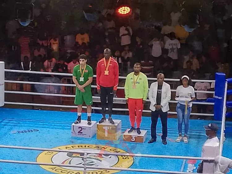 Kenya Air Force Seargent Edwin Okong'o being feted during the 13th All African Games in Ghana after his win.