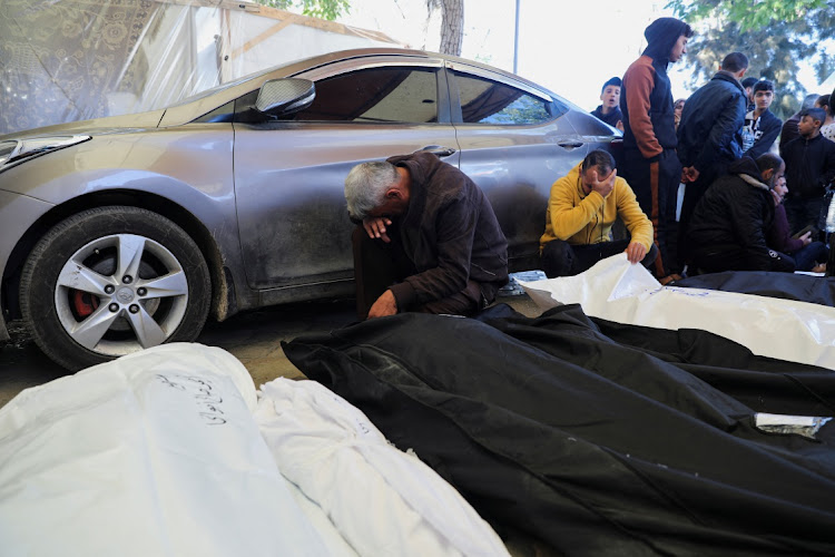 Mourners react next to the bodies of Palestinians killed in an Israeli strike, during their funeral in Khan Younis in the southern Gaza Strip, January 7 2024. Picture: ARAFAT BARBAKH/REUTERS