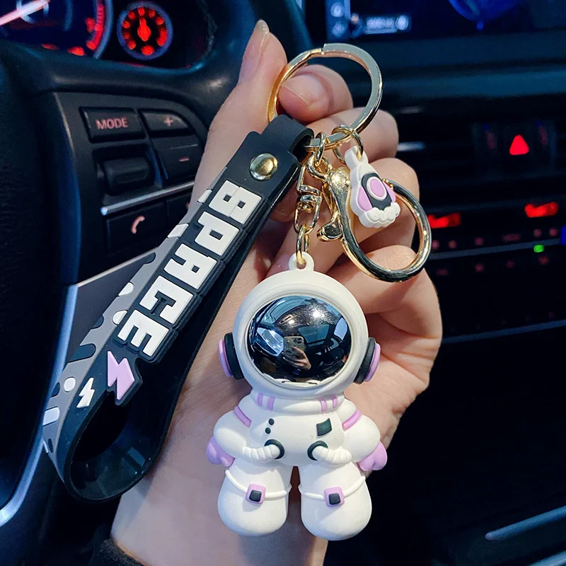 Cartoon Cooler Astronaut Tropfen Delicate Keychain — Dein cooler Schlüsselanhänger, der Deine Schlüssel stilvoll und einzigartig hält.