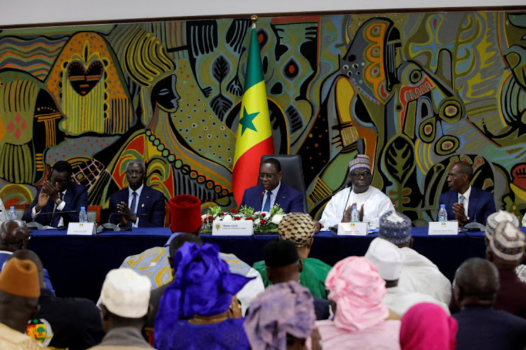 FILE PHOTO: Senegal's president Macky Sall attends a national dialogue that aims easing political tension and violence ahead of the 2024 presidential election in Dakar, Senegal May 31, 2023. REUTERS/Ngouda Dione/File Photo/File Photo