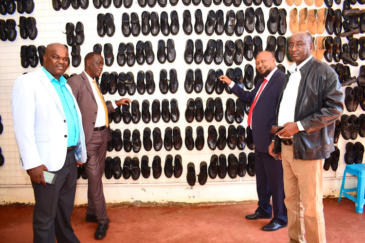 Isiolo county secretary Dade Boru, Tourism executive Lawrence Mwongela and Water executive Wario Sarite during a visit at YETU Leather factory on January 16