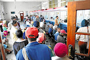 No matter what your bank SMS says, if the cashier’s card machine can produce a slip saying “transaction failed” or something similar, your payment didn’t actually go through. PICTURED: Social-grant beneficiaries queue at a Postbank branch to receive their grants.