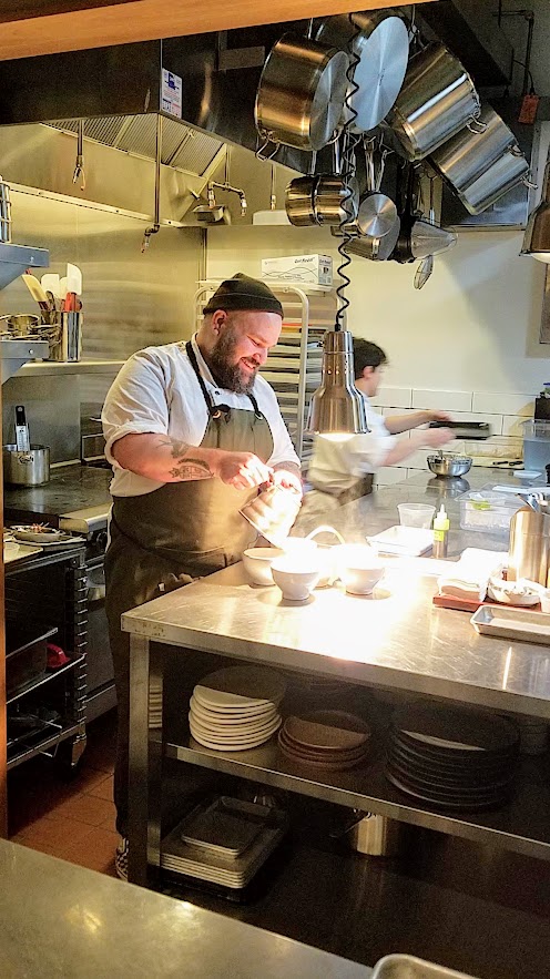 Farm Spirit, an all vegan restaurant, Mushroom duxelle dumplings with buckwheat pasta, nourishing broth, bay laurel oil