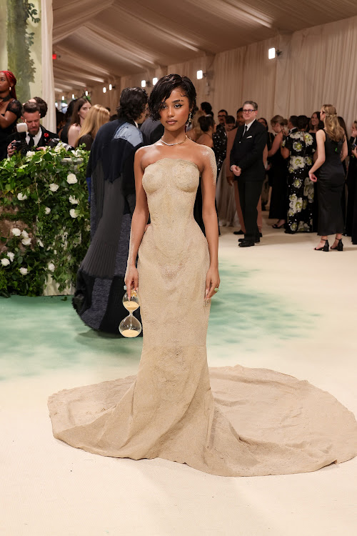 Tyla in a sand sculptured gown attended the 2024 Met Gala in New York last night.