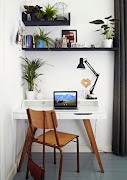 The Anglepoise lamp is a striking and timeless focal point for this stylish corner workspace.