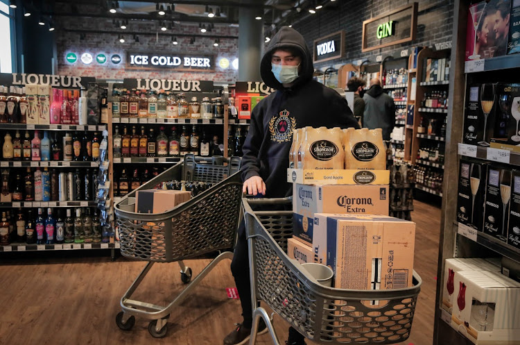 People stock up on booze at the Pick n Pay on Nicol bottle store as the country enters level 3 of the lockdown. Bottle stares have been closed since lockdown was implemented in March in an effort to curb the spread of Covid-19.