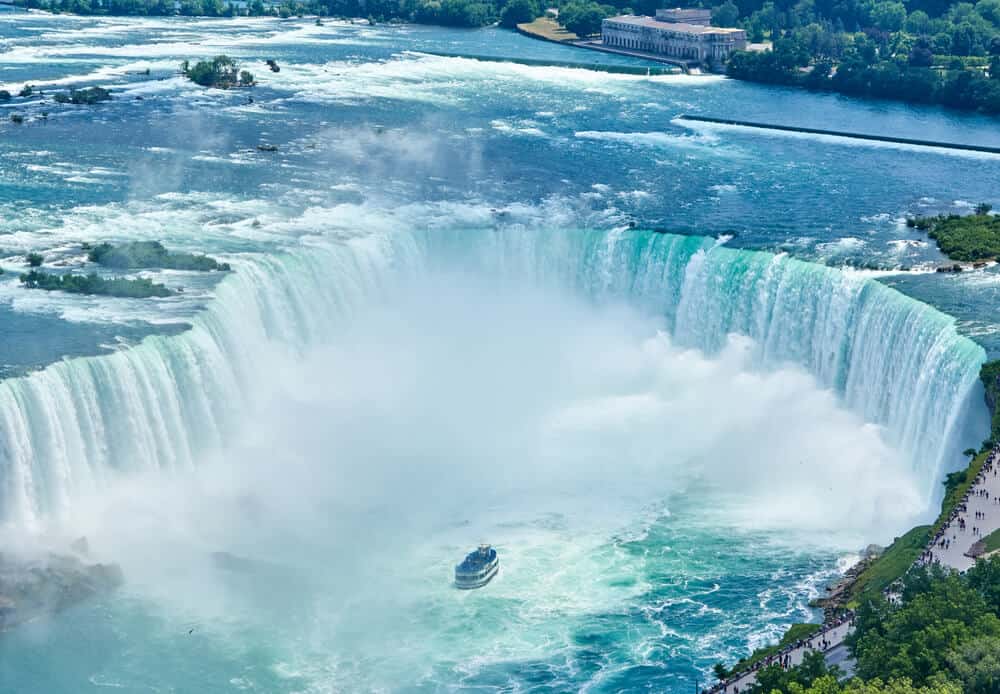 niagara falls with boat in water