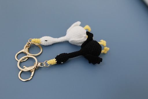 Title 7, Wool woven swan pendant hand-crocheted keychain...